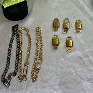 LOUIS VUITTON LOCK AND KEY✨ 🔐 #307,310,315,318,336 COMES WITH UNBRANDED CHAIN